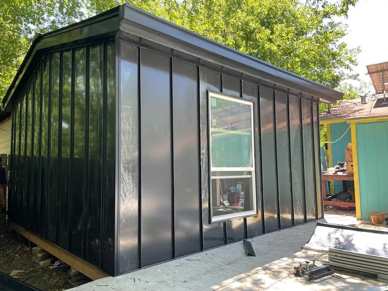 Black standing seam metal wall panels for Roof Inspection in Havre