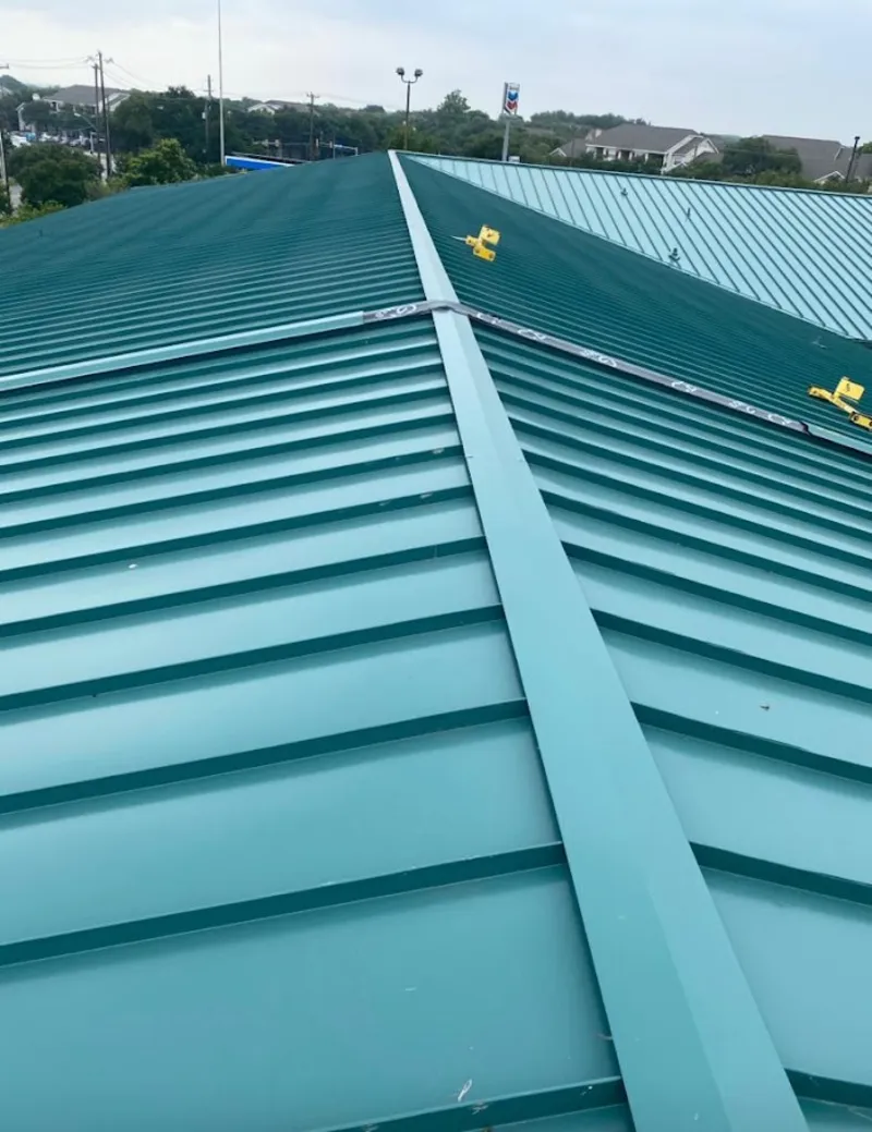 Green commercial metal roof ridge and valley for Metal Roof Repair in Havre
